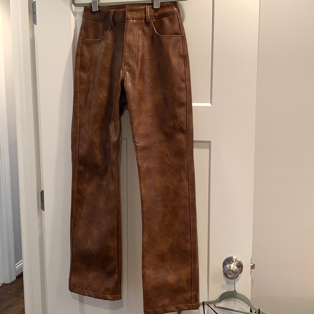 Brown weathered faux leather pants.